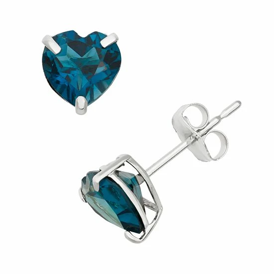 Designs by Gioelli London Blue Topaz 10k White Gold Heart Stud Earrings Designs By Gioelli London Blue Topaz 10k White Gold Heart Stud Earrings -Designs by Gioelli Shop unnamed file 1070